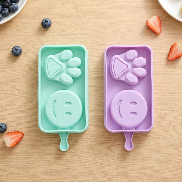 Silicone Paw and Smiley Face Ice Cream Moulds for fun homemade frozen treats in playful shapes.