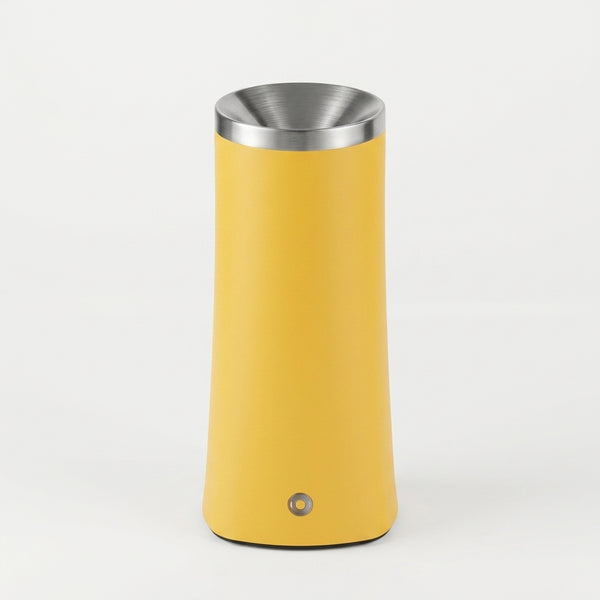 Automatic Egg Roll Maker in bright yellow with stainless steel top for convenient egg roll preparation.