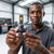 A person holding a 400W LED Headlight Bulbs, showcasing its design and features for automotive lighting.