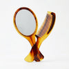Classic Mirror and Comb Grooming Set featuring a stylish tortoiseshell-look handheld mirror and comb.