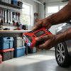 20000mah All in One Emergency Vehicle Jump Starter Pack in a person's hands, showcasing its multi-functional features.