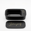 Professional Ultrasonic Mini Jewelry Cleaner in sleek black design with button controls and motivational lid.