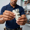 Solar PV Fuse 32A 1000V DC held by a technician during solar installation.