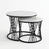 Round Marble-Top Nesting Coffee Tables with Black Metal Base in modern living room setting.
