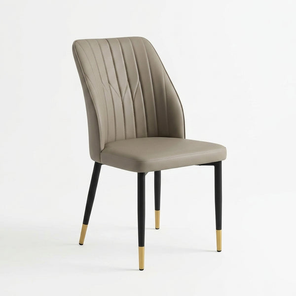 Taupe PU Leather Dining Chair with Gold-Tipped Legs featuring a stylish ribbed design.