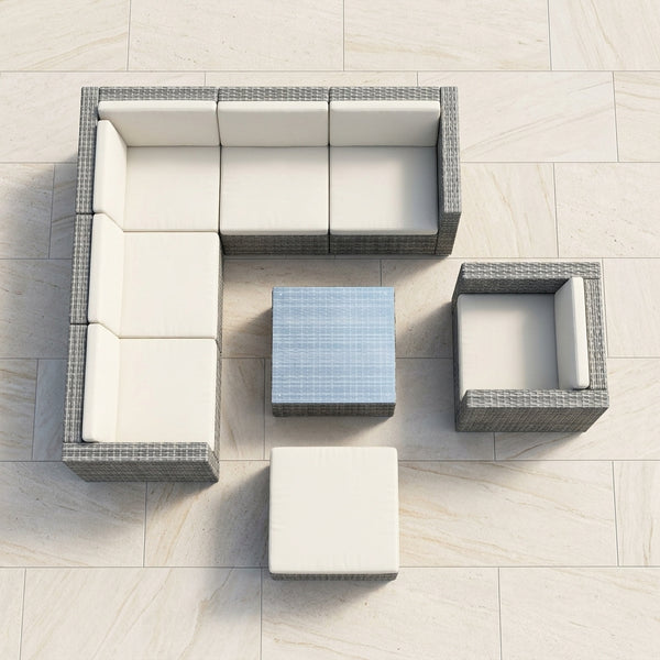 5-Piece Modular Rattan Outdoor Sectional Set arranged in a stylish outdoor space with cushions.