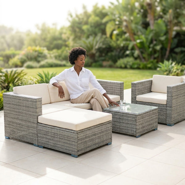 5-Piece Modular Rattan Outdoor Sectional Set with woman relaxing in a garden setting.