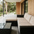 4 Piece Modular PE Rattan Outdoor Sectional Sofa with Coffee Table in a stylish patio setting.