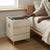 Smart Modern Simple Eco-Friendly Bedside Table with charging feature, stylish design, and storage next to a bed.