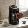 Electric Turkish Coffee Maker with Glass Carafe and Touch Controls in a kitchen setting.