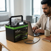 720Wh Portable Power Station AC Output USB-C Solar shown in use by a man working at a desk with a laptop.