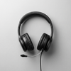 FX-07 Wired Headset with Microphone on a grey background, designed for calls and gaming.