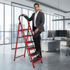 Man using a 6-Step Household Folding Ladder in a modern office setting, showcasing its stability and design. 7-Step Household Folding Ladder