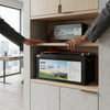 12.8V 200Ah LiFePO4 Lithium Battery displayed in a modern cabinet with a serene office background.
