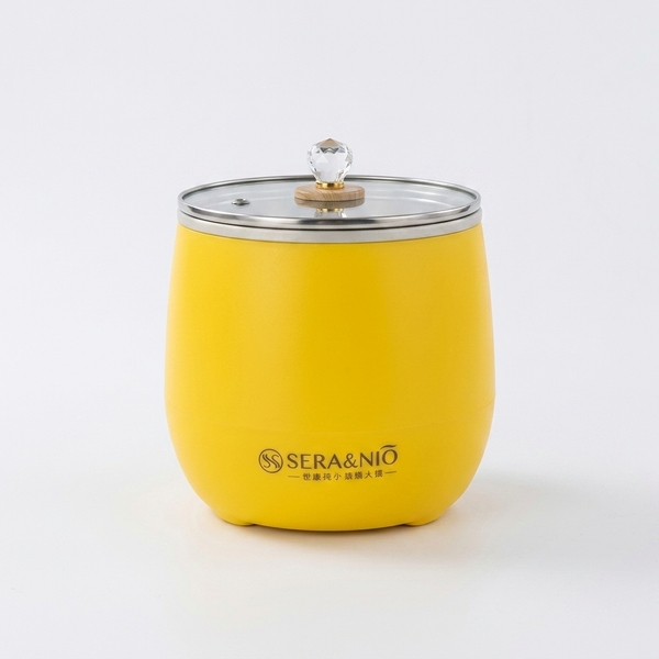 Mini Rice Cooker in vibrant yellow color with a silver lid and decorative knob, ideal for compact kitchen spaces.