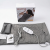 Electric Heated Massage Blanket with remote control and soft surface for relaxing warmth at home.