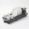 2-Tier Kitchen Dish Drying Rack with Utensil Holder featuring plates, cups, and cutlery drying.