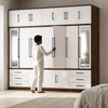 Large Modern Wardrobe with Mirrors in a stylish bedroom setting, featuring multiple storage options and mirrored panels.