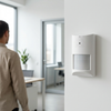 PIR Motion Sensor Home Surveillance Unit monitoring office interior with a person walking by.