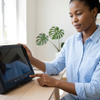 Woman using a TFT Colour Monitor Display Screen on a desk, showcasing its compact design and functionality.