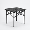 Folding Outdoor Table with Cross-Brace Frame featuring a textured surface and sturdy foldable design.