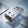 12V 60A Fan-Cooled Switching Power Supply. 12v 40A Fan-Cooled Power Supply Unit with metal enclosure and ventilation openings for effective cooling.