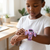 Child wearing a Transforming Robot Digital Watch with a playful robot design, showcasing fun timekeeping.