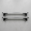 120cm Lockable Car Roof Crossbars displayed on a concrete surface, showcasing lockable features and sturdy design.
