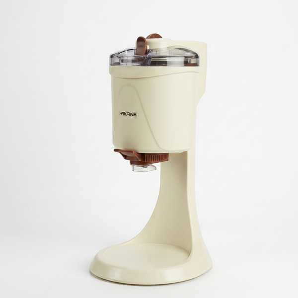 Ice Cream Machine on a countertop, compact design for homemade frozen desserts preparation.