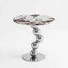 Luna Marble-Look Round Side Table with a stylish round marble top and a chrome ball accent base.