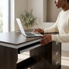 1.2m Office Desk with 3 Drawers featuring a person working on a laptop and organizing office supplies.