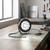 Adjustable LED Wall Spotlight displayed on a workbench, showcasing focused lighting and adjustable design.