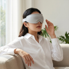 Woman wearing an Adjustable Eye Sleeping Mask, enhancing comfort for sleep, relaxation, and travel.