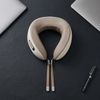 Contoured Neck Support Pillow with a supportive wraparound design, perfect for resting and traveling.