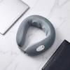 Wearable Neck Massager in gray color on marble surface, featuring integrated controls for easy operation.