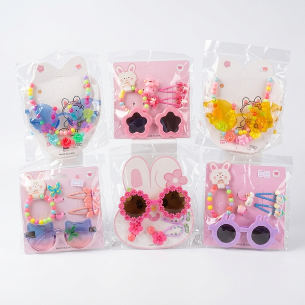 Childrens Hair Accessories & Sunglasses Set featuring colorful designs and playful accessories for kids.