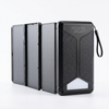Foldable Solar Power Bank 30000mAh with 5W Panel, featuring a compact design and solar charging capability.