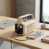 50000mAh Portable Power Bank with Multiple Charging Ports connected to a smartphone on a wooden table.