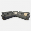 L-Shaped Sectional Sofa in a modern living room setting with plush cushions and neutral decor accents.