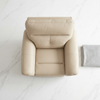 Top view of a beige recliner chair from a 3-Piece Reclining Sofa Set beside a gray throw blanket.