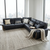 L-Shaped Sectional Sofa with plush cushions and decorative pillows in modern living room setting.