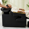 Professional Salon Shampoo Chair with Wash Basin & Footrest used for comfortable hair washing treatment.