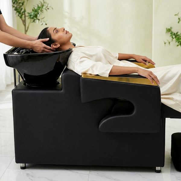 Professional Salon Shampoo Chair with Wash Basin & Footrest used for comfortable hair washing treatment.