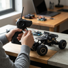 Person controlling a 4WD Remote Control Off-Road Rock Crawler Truck with a pistol-grip remote in a home setting.