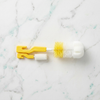 2-in-1 Baby Bottle & Teat Cleaning Brush Set with soft sponge tips and nylon bristles on a marble surface.