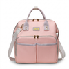 Convertible Canvas Diaper Bag Backpack with Shoulder Strap in stylish pink with dual front pockets.