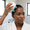 Woman using Electric Scalp Massage Brush with 4 Massage Heads for a relaxing scalp massage at home.