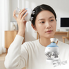 Woman using Electric Scalp and Head Massager for a relaxing at-home massage experience.