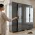 Modern Multi-Door Wardrobe Cabinet with Storage in a stylish bedroom setting.