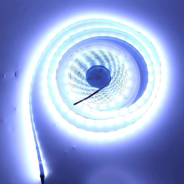 3000K 5M LED Light Bar coiled, showcasing warm white lighting ideal for accent decor in homes.